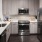 a kitchen with stainless steel appliances